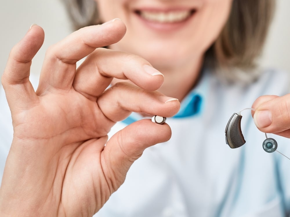 Color-coded zinc-air hearing aid batteries in sizes 10, 312, 13, and 675 at AUDIO-LOGIC, PC in Columbus, NE
