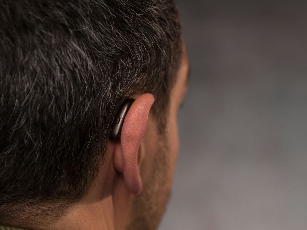 New hearing aids being programmed during a hearing aid fitting at AUDIO-LOGIC, PC in Columbus, NE