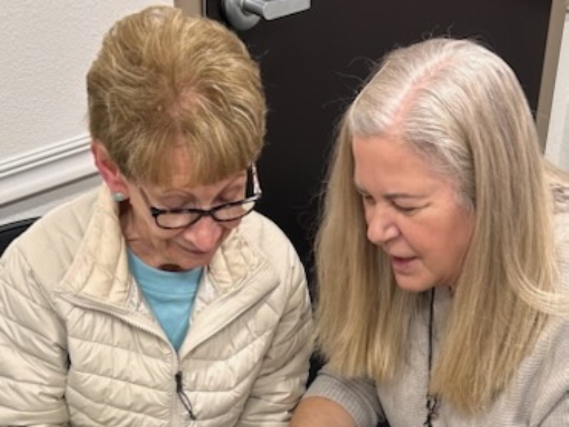 Dr. Fuchs reviewing hearing test results with a patient at AUDIO-LOGIC, PC in Columbus, Nebraska